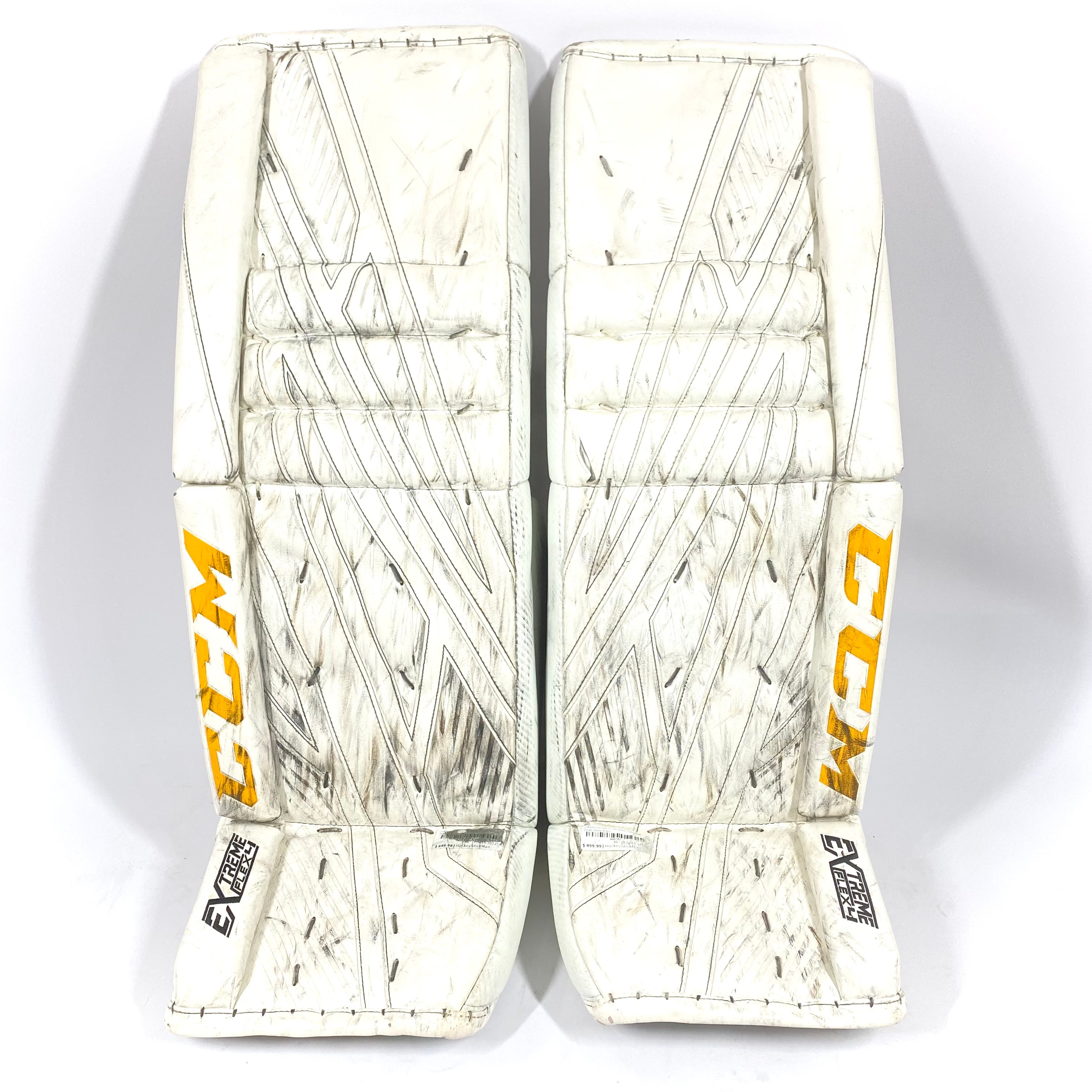 CCM Extreme Flex IV - Used Pro Stock Goalie Pads - (White/Yellow/Black)